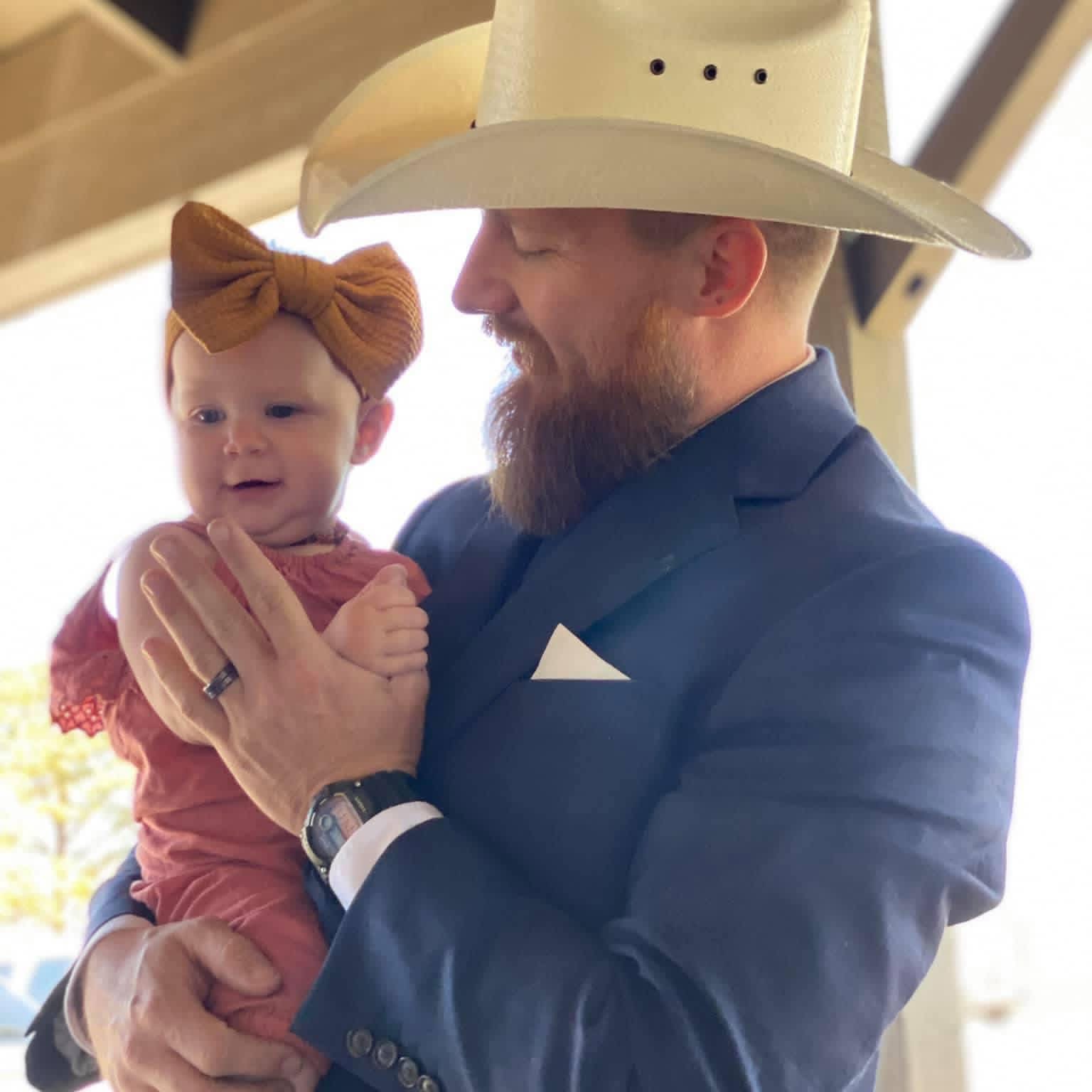 Russel sharing a quiet moment with his daughter